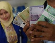 Hukum Jual Beli Uang Baru Saat Lebaran